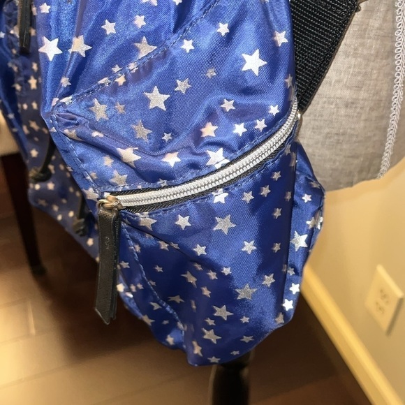 AMERICAN EAGLE
Payless American Eagle silver stars with blue Backpack /Dark Blue - Picture 4 of 8